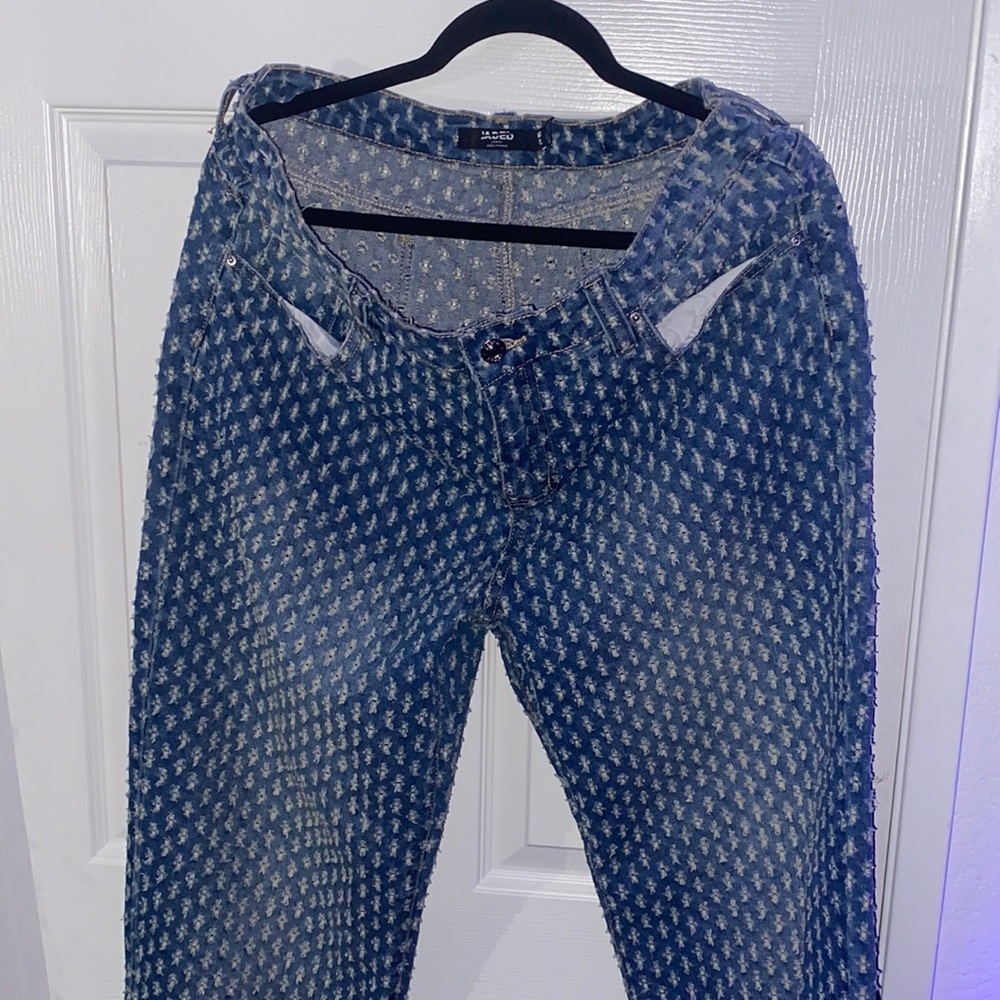 Jaded man distressed jeans